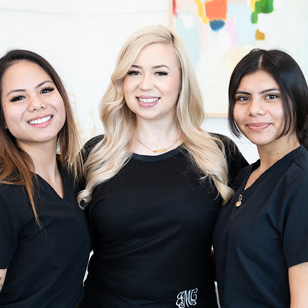 Edge Dental & Orthodontics team members happily smiling