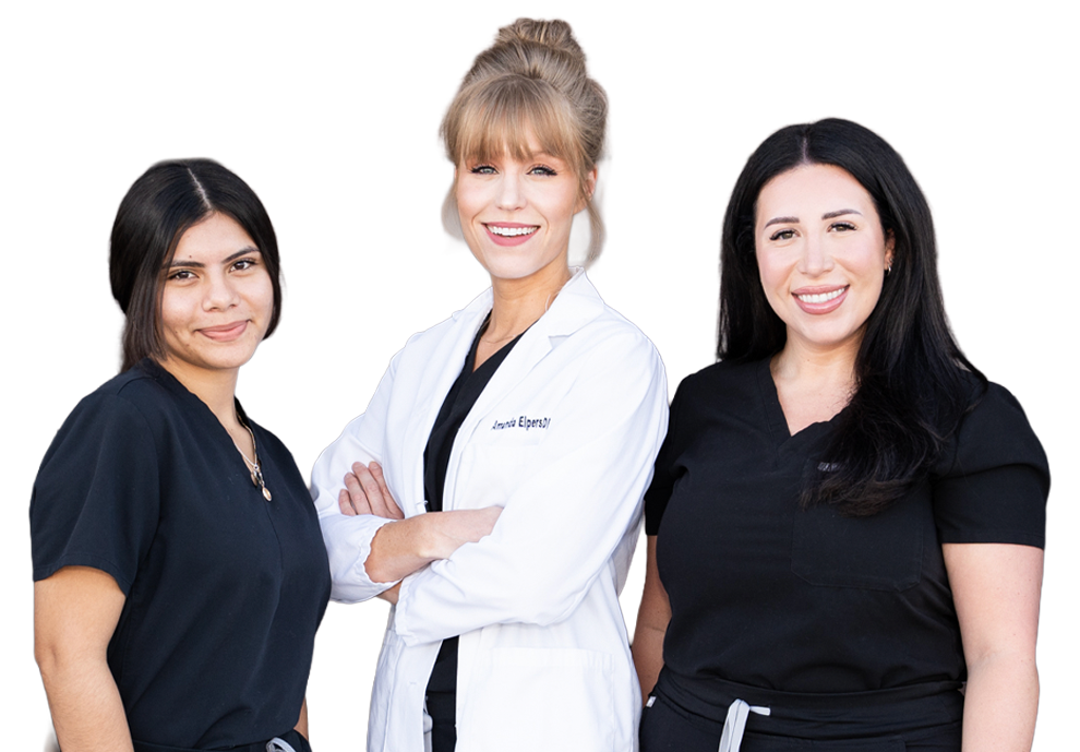 A woman giving a piggyback ride to a girl